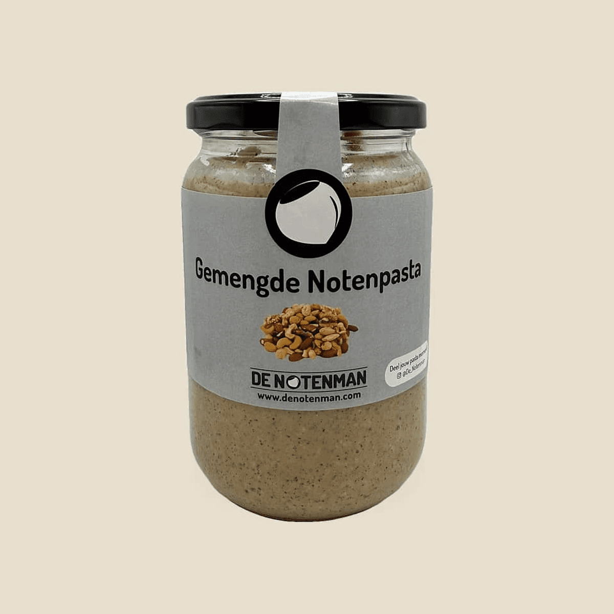 Glazen pot gemengde notenpasta met etiket van De Notenman
