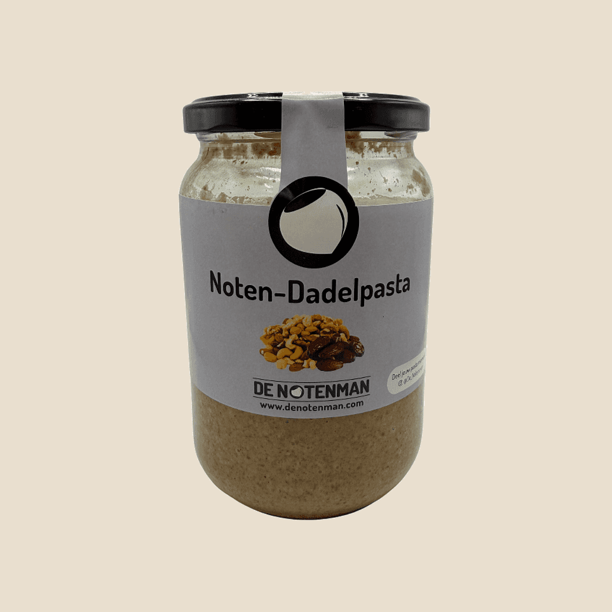 Glazen pot noten-dadelpasta met etiket van De Notenman